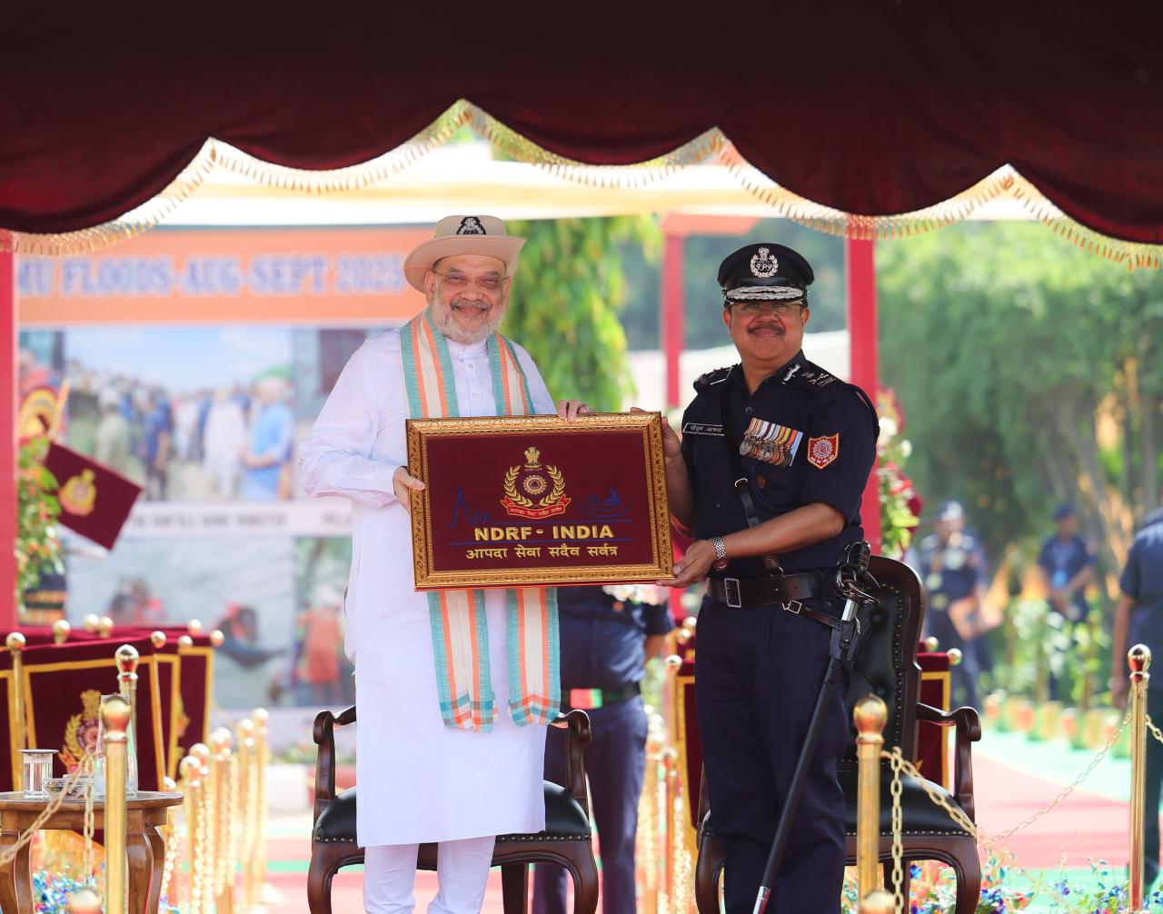 Union Home Minister and Minister of Cooperation Shri Amit Shah confers President's Colour Award to NDRF in Ghaziabad, Uttar Pradesh, as the Chief Guest.