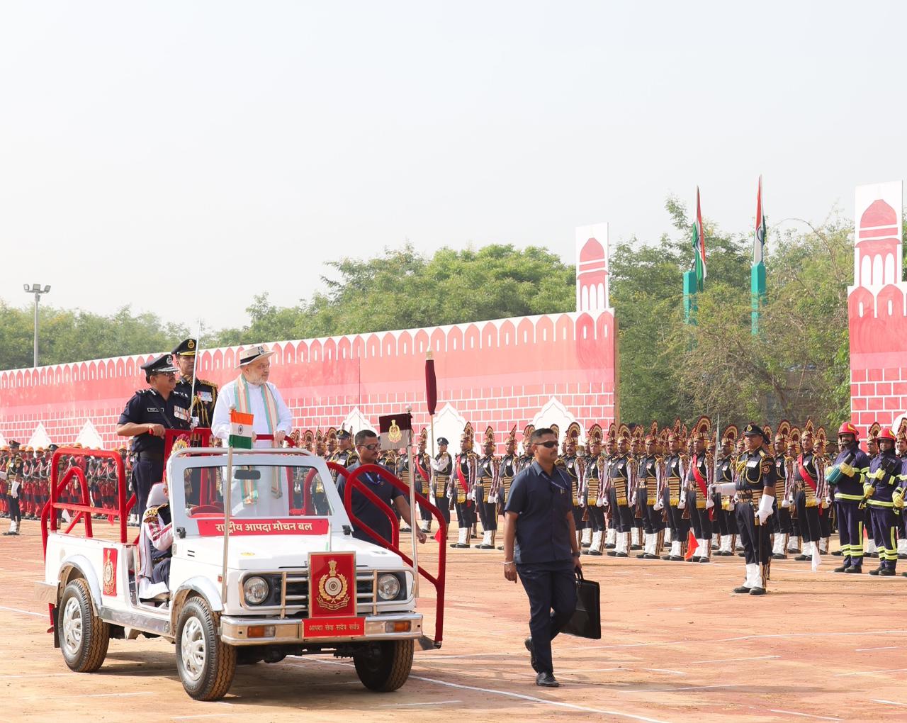 Union Home Minister and Minister of Cooperation Shri Amit Shah confers President's Colour Award to NDRF in Ghaziabad, Uttar Pradesh, as the Chief Guest.