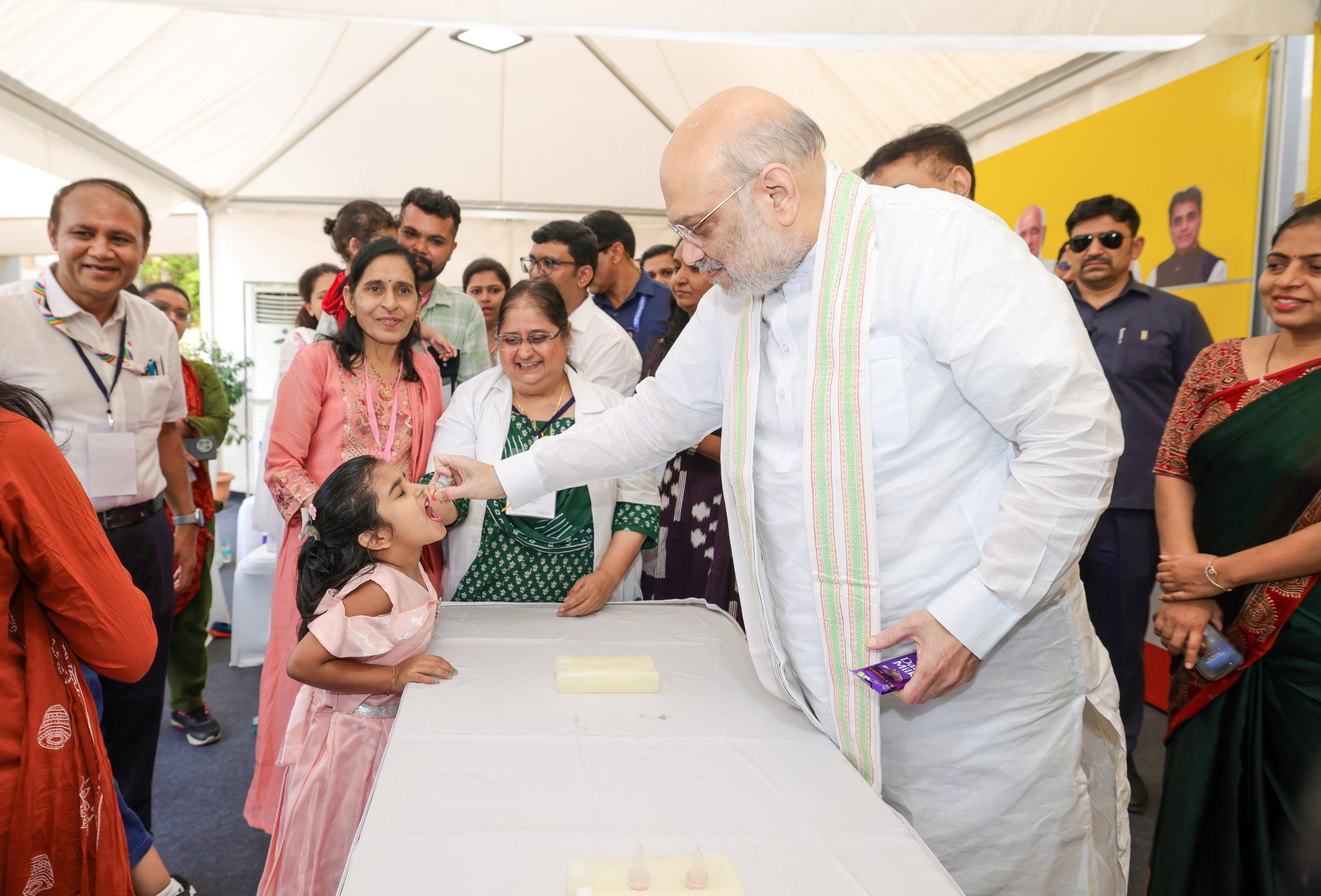 Union Home Minister and Minister of Cooperation Shri Amit Shah administered polio drops to children today  on the occasion of the launch of the PM Family Care Tracker in Gandhinagar